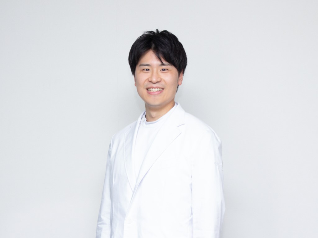 松任 健一